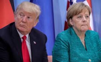 Migrants : Merkel sous pression  des durs de son gouvernement et de Trump
